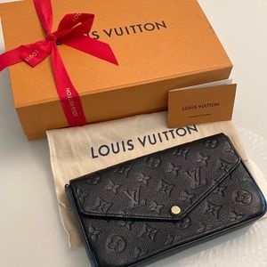 Pochette Felicie in Monogram empreinte black from Louis Vuitton